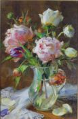 A 20th century gilt framed oil on canvas on board of a vase of roses and flowers, indistinctly