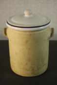 A Moira large twin handled stoneware internally glazed kitchen storage jar. Maker's stamp to the