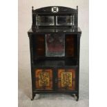 A Victorian Aesthetic Movement ebonised side cabinet, in the manner of James Lamb of Manchester