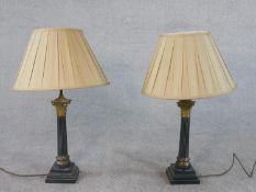 A pair of classical fluted column spelter and brass table lamps with cream silk shades. H.73cm