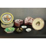 A set of 1950's Italian hand painted kidney shaped side dishes (one broken and repaired) along
