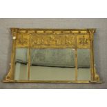 A Regency giltwood triple bevelled plate over mantle mirror with classical figure frieze, inverted