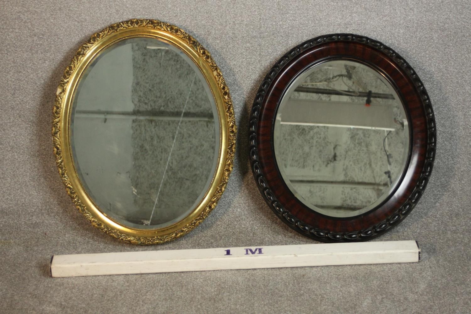 Two oval wall mirrors, one ebonized and one gilt framed. H.68 W.54cm. (largest) - Image 2 of 7