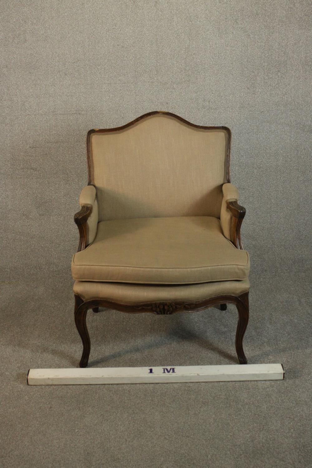 A French Louis XV provincial walnut fauteuil á la reine, with carved floral apron, cabriole legs, - Image 2 of 9