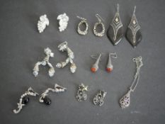A collection of seven pairs of vintage earrings and a pendant, Some silver set with gemstones.