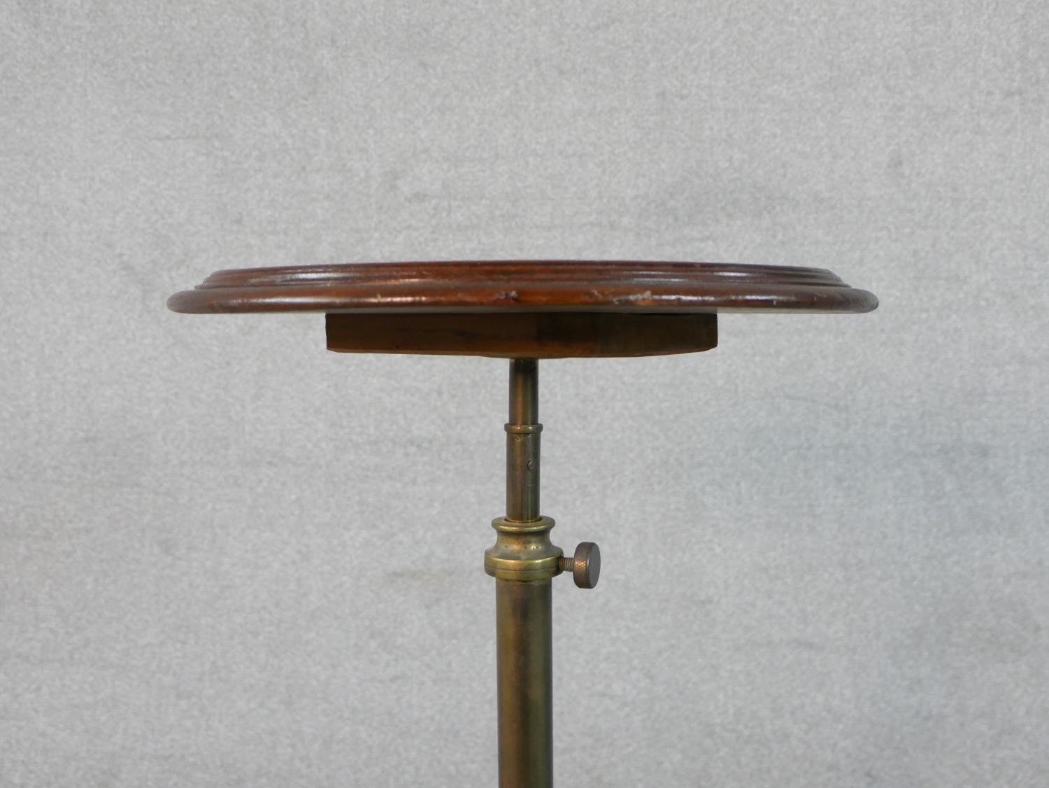 A late Victorian adjustable occasional or lamp table, the circular dished top on a telescopic - Image 4 of 5