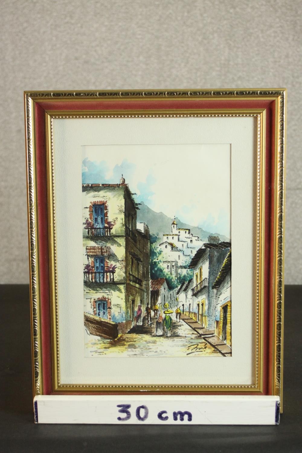 A framed and glazed watercolour of a Mexican town street scene, signed Buiz. H.40 W.31cm. - Image 3 of 5