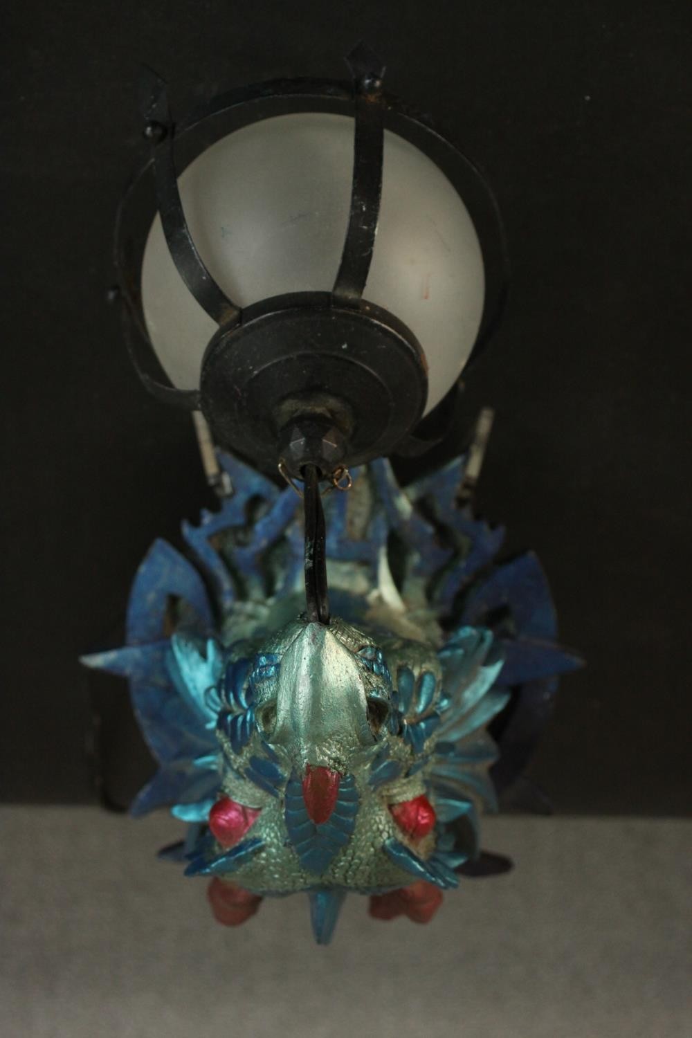 A moulded metallic painted dragon head wall lamp with caged frosted glass globe shade. H.33 W.23 D. - Image 4 of 7