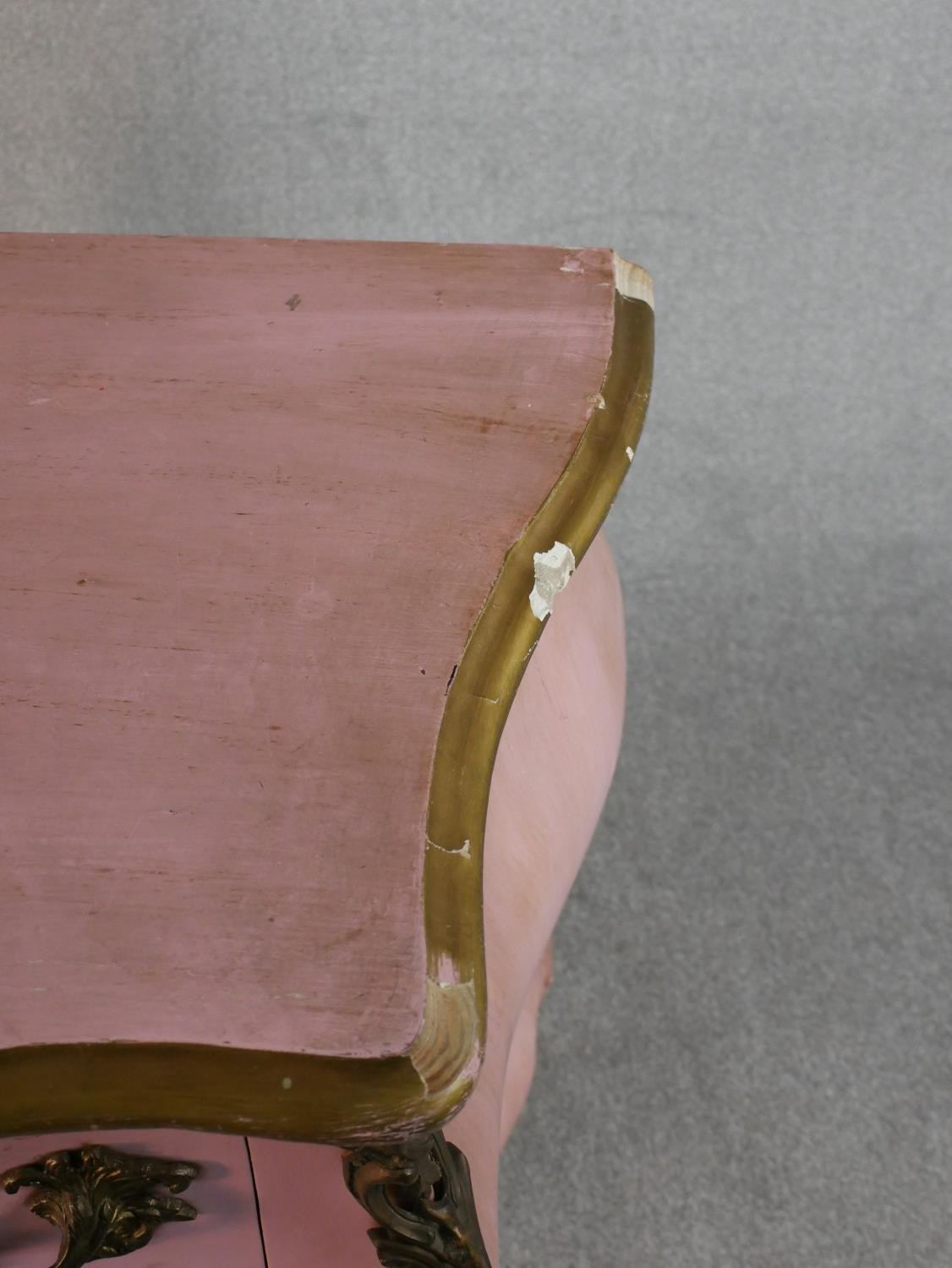 A pink painted Louis XV style bombe chest of drawers, the top with a moulded parcel gilt edge over - Image 6 of 6