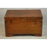 A teak and brass bound chest with fitted interior and twin carrying handles. H.47 W.78 D.46cm.
