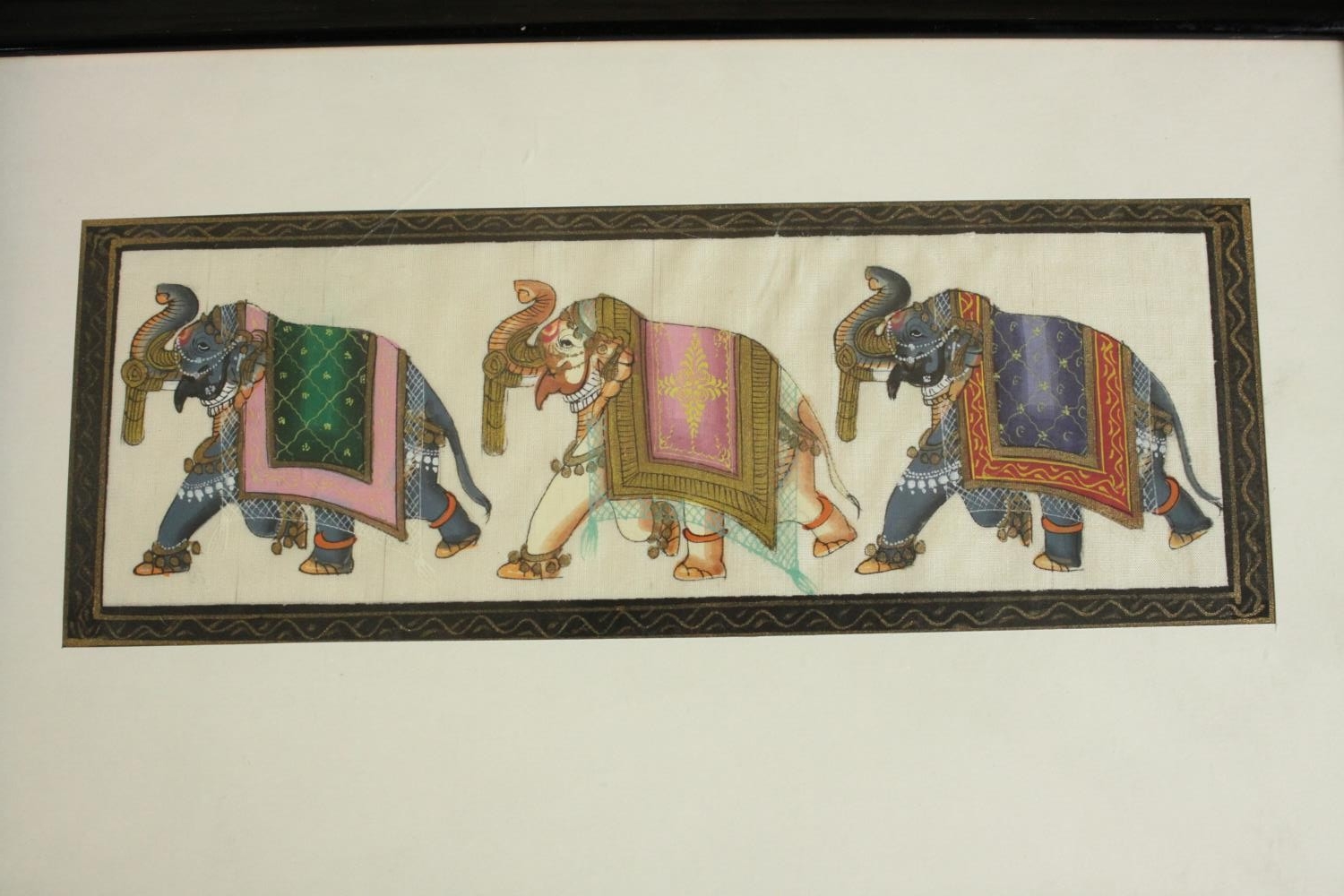 Three framed and glazed Indo-Persian Mogul gouache on paper paintings of elephants and horses in - Image 7 of 8