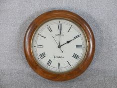 A Smiths London mahogany framed vintage wall clock. Diam.40cm