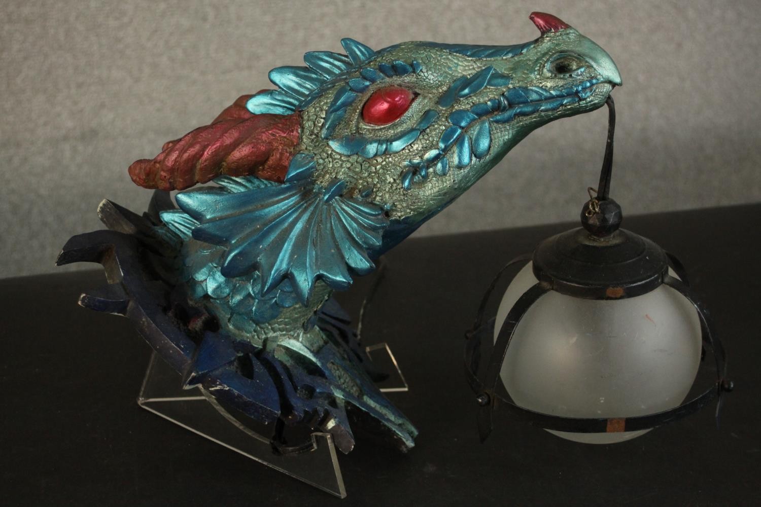 A moulded metallic painted dragon head wall lamp with caged frosted glass globe shade. H.33 W.23 D. - Image 7 of 7