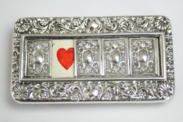 A Victorian hallmarked sterling silver repousse decorated Bridge/Trump marker, sliding window to
