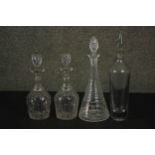 A pair of 19th century hand cut crystal decanters along with a 19th century decanter with slender