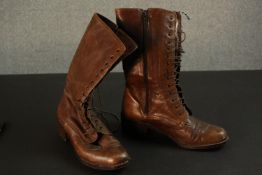 A pair of 1940's laced brown leather boots. Size 38.