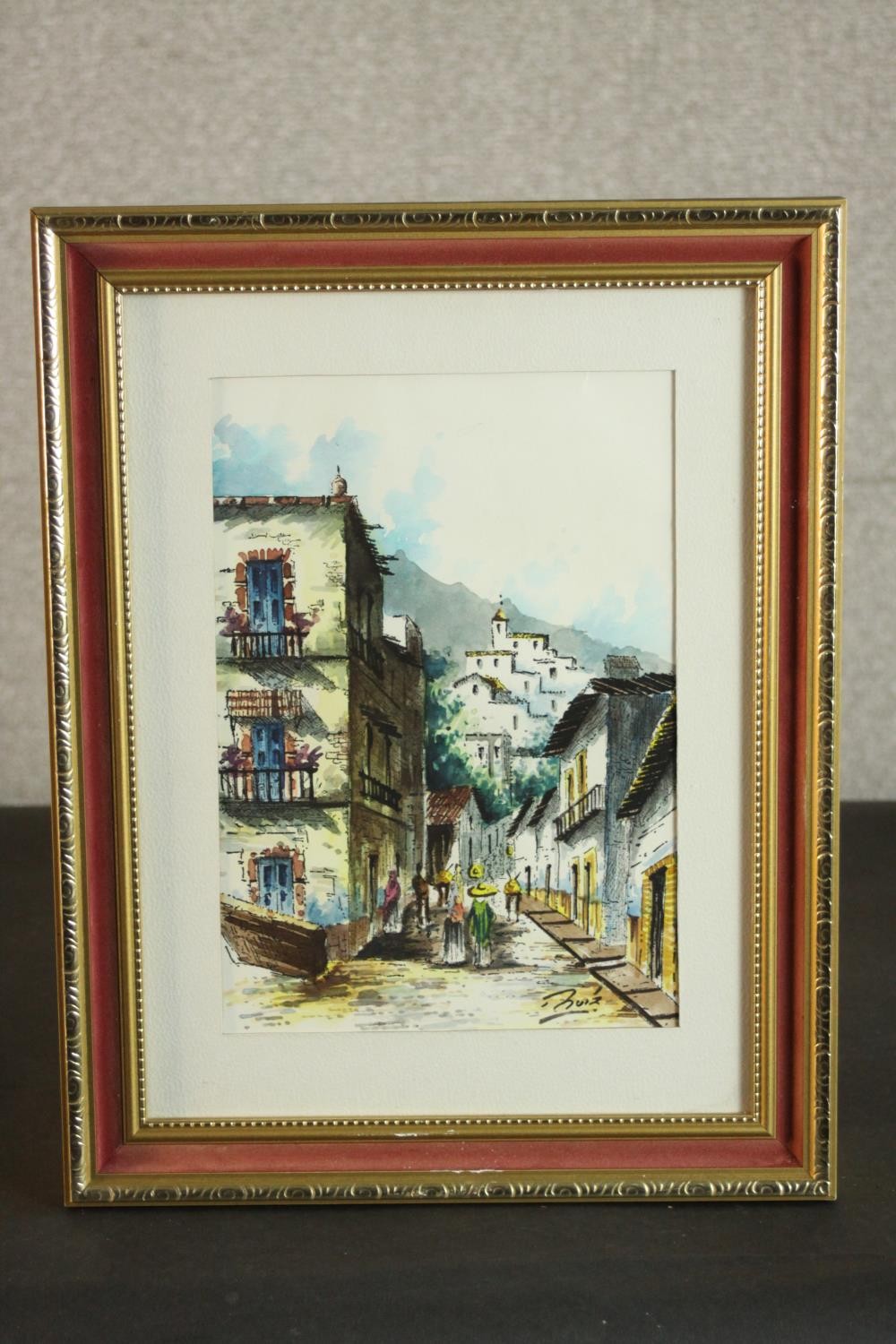 A framed and glazed watercolour of a Mexican town street scene, signed Buiz. H.40 W.31cm. - Image 2 of 5