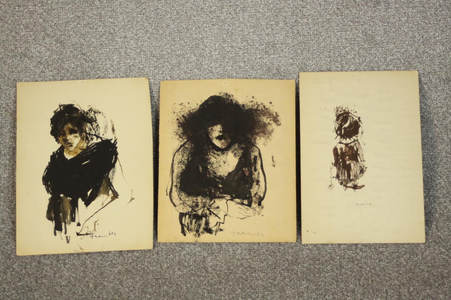 Three unframed ink drawings of figural studies, indistinctly signed. H.28 W.21cm.