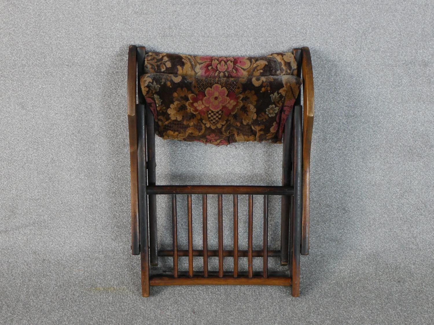 An early 20th century fruitwood folding armchair, with a spindle back, the seat upholstered in a - Image 6 of 6