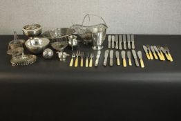 A large collection of silver plate, including various silver plated fish cutlery with engraved