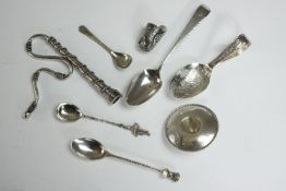 A collection of novelty silver items, including a miniature Mexican hat with engraved design, a