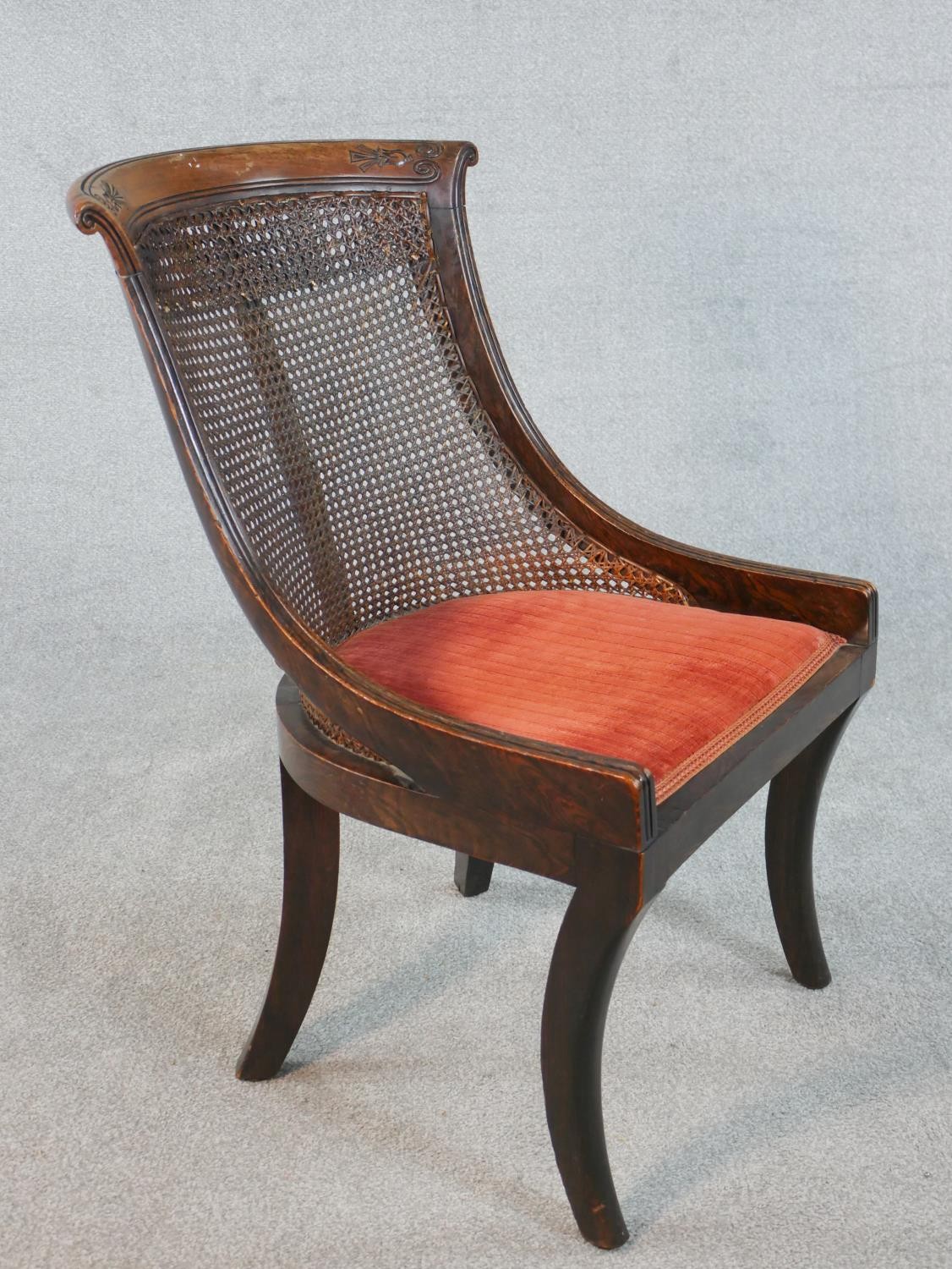 A Regency simulated rosewood bergere type side chair, the carved bar back over caning, above a red - Image 2 of 5
