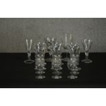 A collection of 19th and 20th century drinking glasses, including a set of six petal faceted