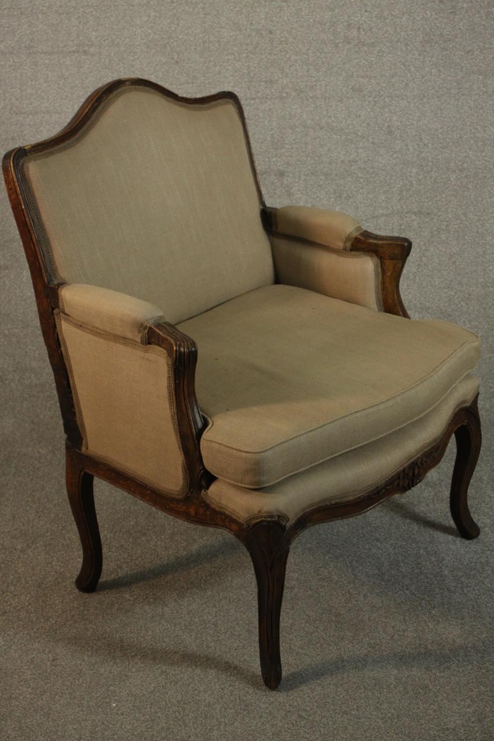 A French Louis XV provincial walnut fauteuil á la reine, with carved floral apron, cabriole legs, - Image 3 of 9