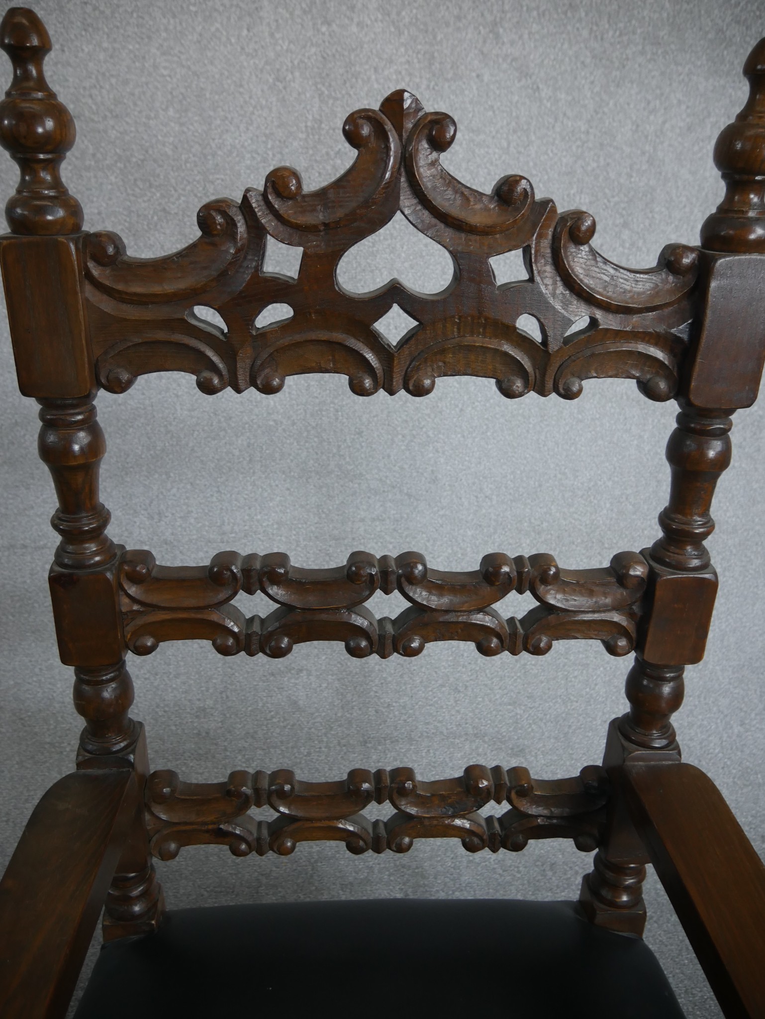 A pair of Spanish walnut ladder back carvers, the back carved with C scrolls over a black leather - Image 3 of 4