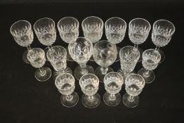 A collection of seventeen pressed glass and cut crystal sherry/liqueur glasses with various