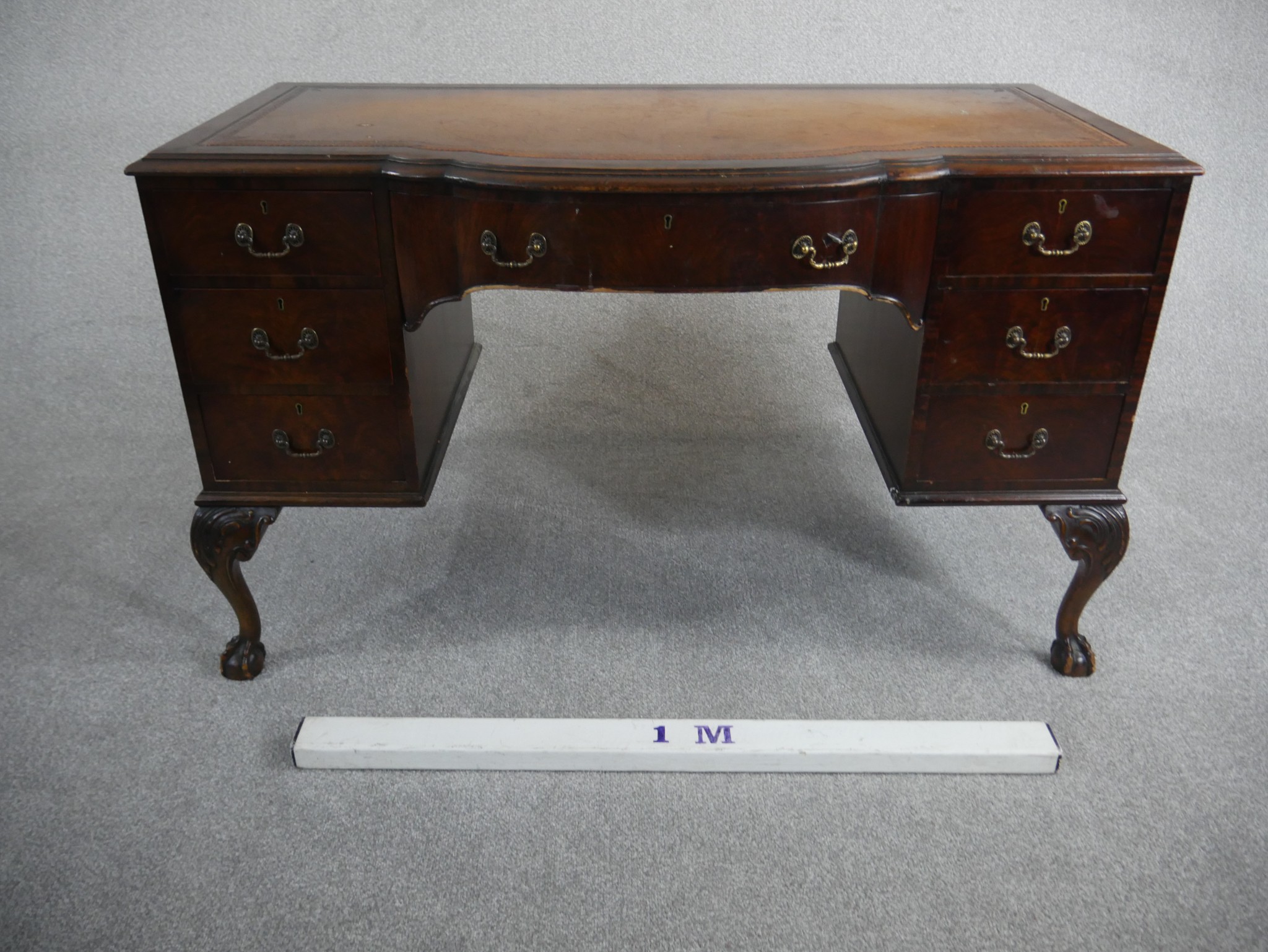 An Edwardian mahogany writing table, the top with a tooled brown leather writing surface and a bow - Image 2 of 4