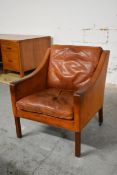 Borge Mogensen, a model 2207 club armchair in tan leather. H.80 x W.73 x D.69cm