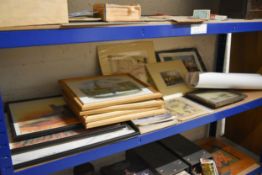 A shelf of Pictures and Prints.