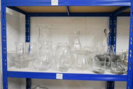 A shelf of Glassware.