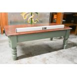 A Victorian pine low table on a painted base with turned supports. H.49 x W.136 x D.66cm