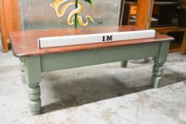 A Victorian pine low table on a painted base with turned supports. H.49 x W.136 x D.66cm