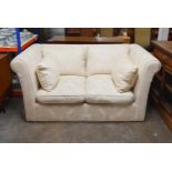A contemporary two seater sofa. L.180 x D.110 x H.85cm