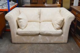 A contemporary two seater sofa. L.180 x D.110 x H.85cm