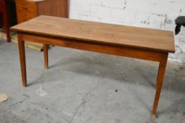 A small elm refectory dining table with planked top on square tapering supports. H.74 x W.164 x D.