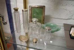 A collection of Silver Topped Bottles, Mirror and Art Deco Jadeite Ashtray