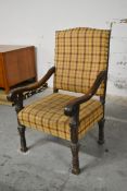 A late 17th century carved oak throne chair in tartan upholstery. 69cm H x 67cm D x 110cm H.