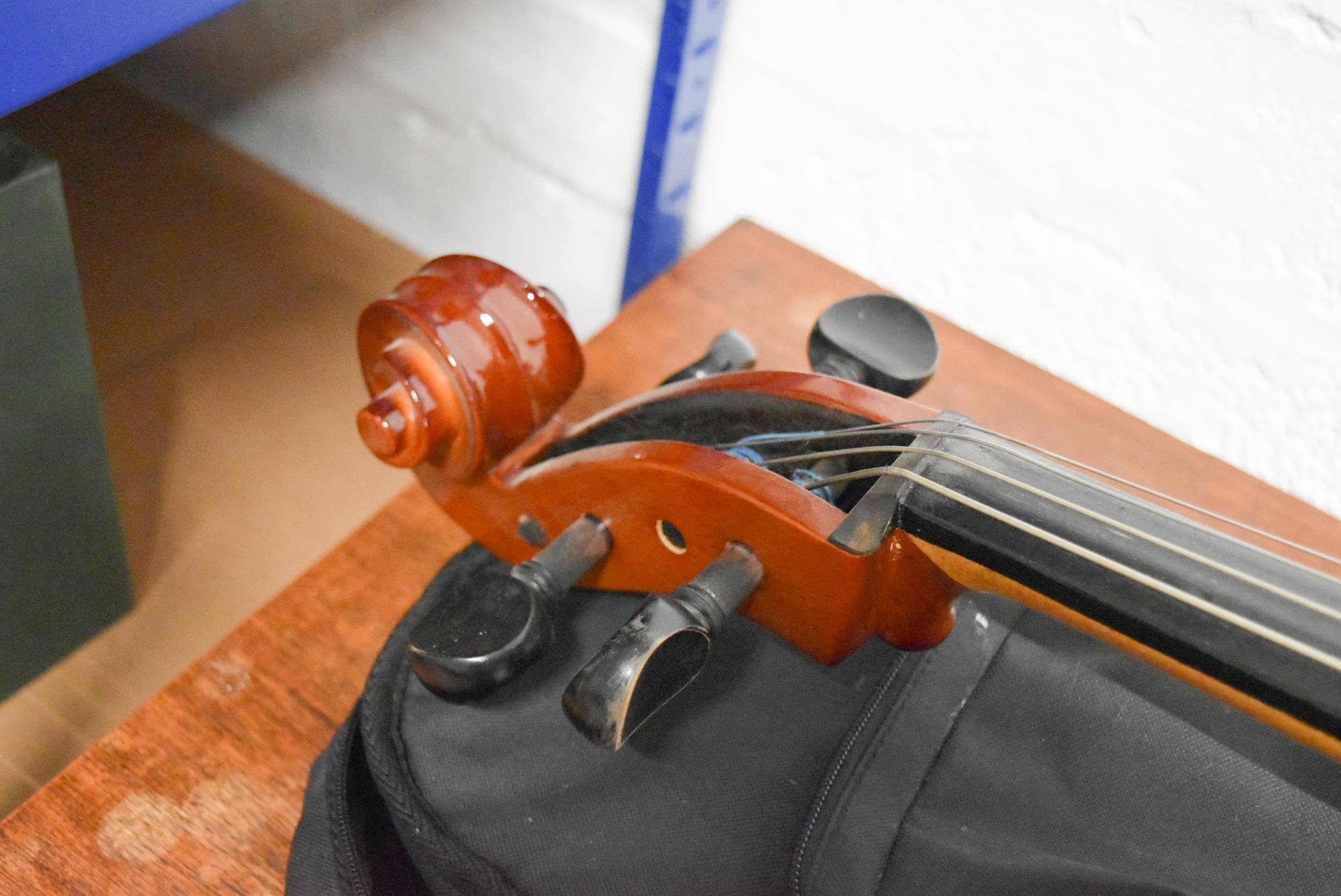 A modern cello and carrying case. - Image 9 of 10