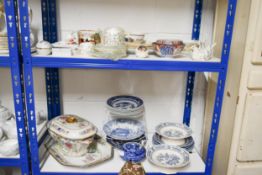 Two shelves of 19th and 20th century ceramics.