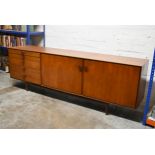 Ib Kofod-Larsen for G-Plan, a mid century teak sideboard fitted with cupboards and drawers on