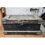 A vintage metal bound tool chest with fitted interior and a collection of vintage woodworking tools.