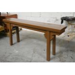 A Chinese painted hardwood console table on square section supports. 86cm L x 37cm D x 82cm H.