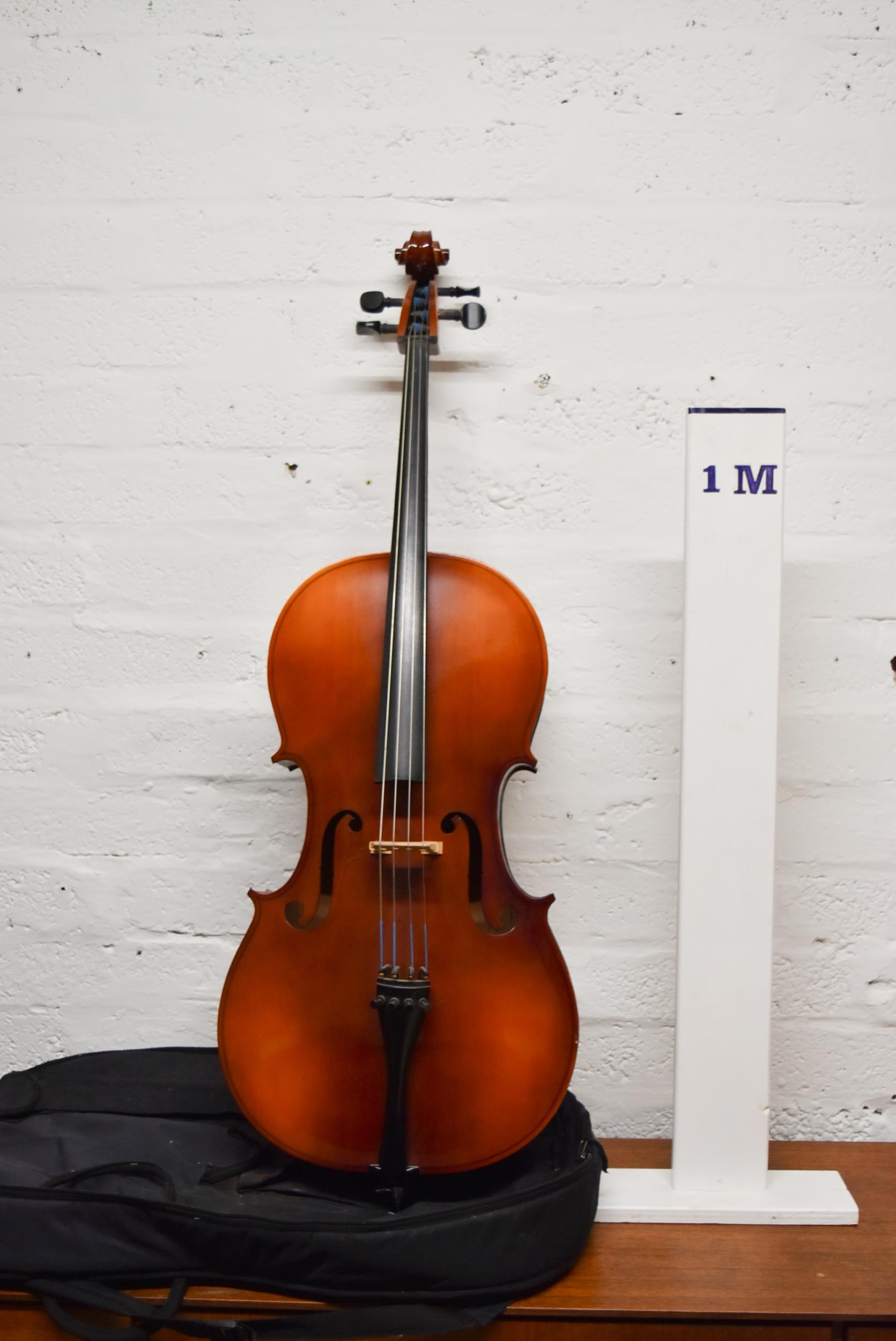 A modern cello and carrying case. - Image 2 of 10