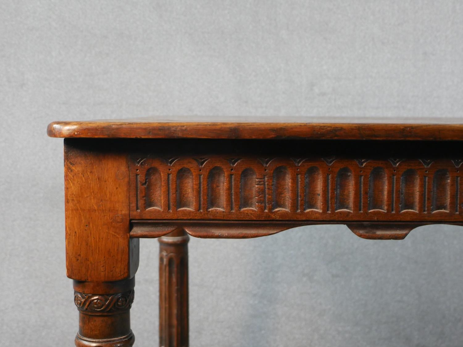 An early 20th century oak refectory dining table, the rectangular top with rounded corners over a - Image 2 of 5