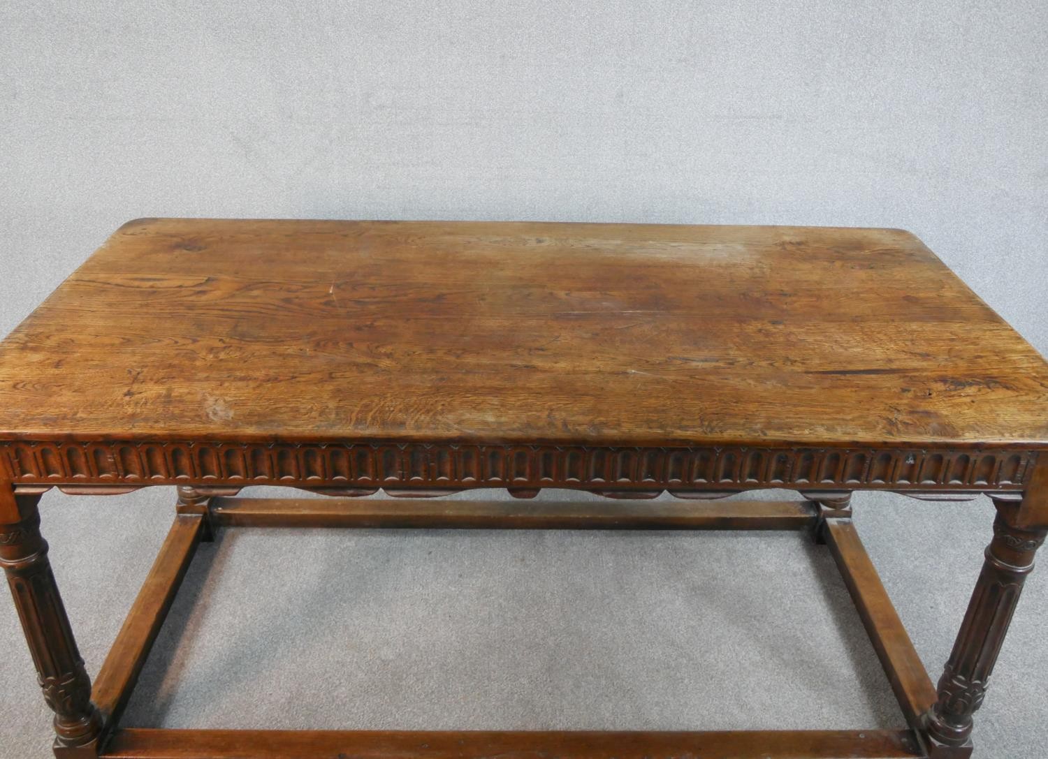 An early 20th century oak refectory dining table, the rectangular top with rounded corners over a - Image 4 of 5