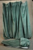 A pair or green velvet fully lined blackout curtains. L.250 W.250cm. (each)